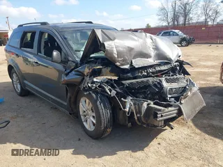 2015 Dodge Journey SXT with VIN 3C4PDCBG0FT733952, listed as a IAAI auction lot 41521687 with 80,974 mi miles and . Bid and sale history available at DreamBid. Image 1.