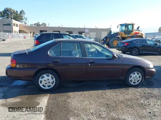 1999 Nissan Altima XE with VIN 1N4DL01D3XC209869, listed as a IAAI auction lot 41414580 with 175,076 mi miles. Bid and sale history available at carsss.com. Image 13.