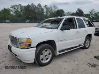 2002 GMC Yukon Denali z VIN 1GKEK63U02J317408, wystawiony jako Copart lot #53707155 z przebiegiem 212 295 mil mil oraz Szkoda całkowita • Salvage title. Historia ofert i sprzedaży dostępna na DreamBid. Obrazek 1.