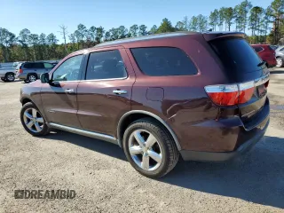 2012 Dodge Durango Citadel with VIN 1C4RDHEG5CC130259, listed as a Copart auction lot 82764844 with 145,930 mi miles and Salvage title. Bid and sale history available at DreamBid. Image 2.