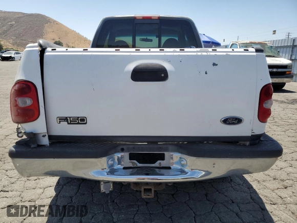 1999 Ford F-150 XL with VIN 1FTRX08LXXKA81637, listed as a Copart auction lot 64637375 with Not provided miles and Salvage title. Bid and sale history available at DreamBid. Image 6.
