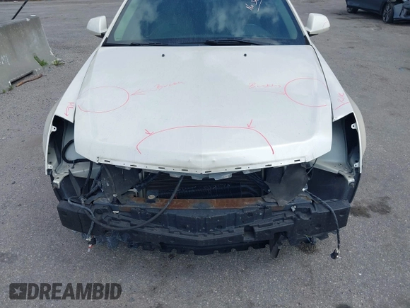 2008 Cadillac CTS RWD with VIN 1G6DV57V880128535, listed as a IAAI auction lot 39097540 with 153,140 mi miles and . Bid and sale history available at DreamBid. Image 6.