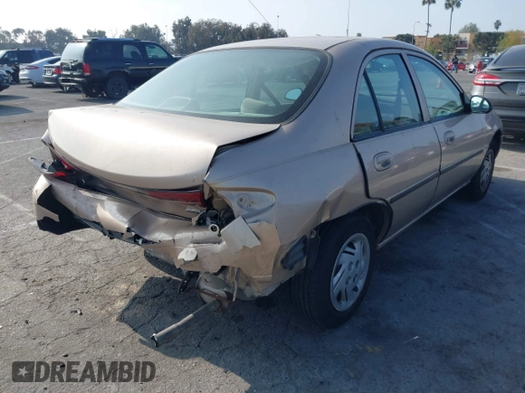 1999 Ford Escort LX with VIN 1FAFP10P3XW138847, listed as a IAAI auction lot 41216936 with 62,672 mi miles and . Bid and sale history available at DreamBid. Image 4.
