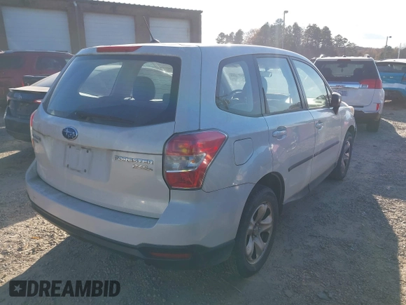 2014 Subaru Forester 2.5i with VIN JF2SJAAC4EG414600, listed as a IAAI auction lot 41006289 with 128,611 mi miles. Bid and sale history available at carsss.com. Image 4.
