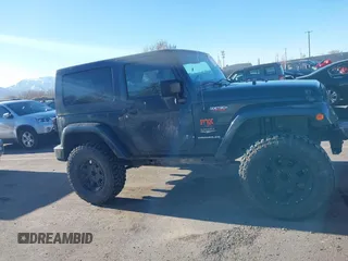 2008 Jeep Wrangler Sahara with VIN 1J4FA54108L543764, listed as a IAAI auction lot 41867734 with 186,145 mi miles and . Bid and sale history available at DreamBid. Image 14.