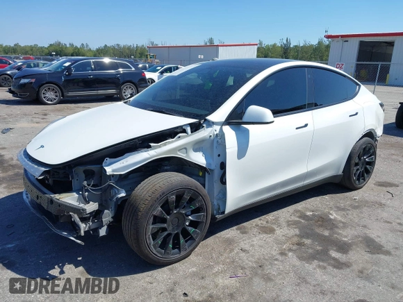2022 Tesla Model Y Long Range with VIN 7SAYGAEE8NF431786, listed as a IAAI auction lot 41750353 with 67,846 mi miles and . Bid and sale history available at carsss.com. Image 18.