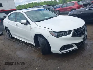 2019 Acura TLX w/A-Spec Pkg z VIN 19UUB3F60KA005206, wystawiony jako IAAI lot #42180267 z przebiegiem 114 845 mil mil oraz . Historia ofert i sprzedaży dostępna na DreamBid. Obrazek 1.