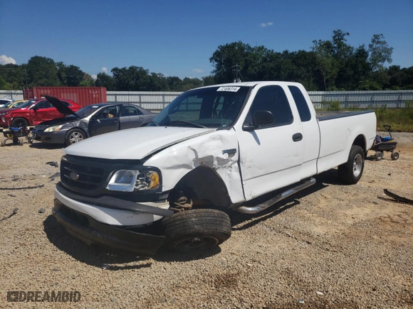 1999 Ford F-150 Work Series with VIN 1FTRX17W4XNA44647, listed as a Copart auction lot 72406314 with 300,152 mi miles and Salvage Title. Bid and sale history available at carsss.com. Image 1.