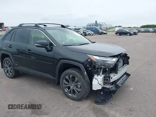 2024 Toyota RAV4 Hybrid XLE Premium with VIN JTMB6RFV7RD139157, listed as a IAAI auction lot 42347791 with 6,672 mi miles and . Bid and sale history available at DreamBid. Image 1.