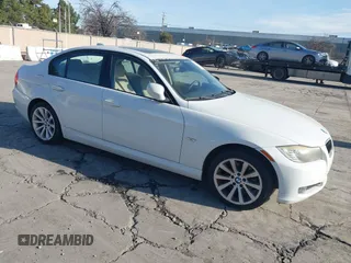 2011 BMW 3 Series 328i with VIN WBAPH5G57BNM79459, listed as a IAAI auction lot 41594564 with 113,333 mi miles. Bid and sale history available at carsss.com. Image 1.