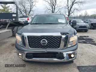 2017 Nissan Titan Platinum Reserve z VIN 1N6AA1E5XHN530256, wystawiony jako IAAI lot #42031654 z przebiegiem 97 200 mil mil oraz . Historia ofert i sprzedaży dostępna na DreamBid. Obrazek 12.