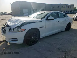 2014 Jaguar XJ Supercharged с VIN SAJWA1GT4EMV60053, выставлен на аукционе Copart как лот 57643005 с пробегом 48 139 миль миль и Списание • Salvage title. История ставок и продаж доступна на DreamBid. Изображение 1.