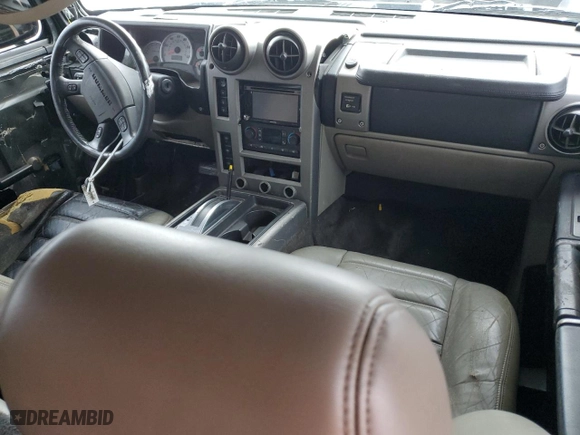 2003 Hummer H2 with VIN 5GRGN23UX3H121939, listed as a Copart auction lot 69503424 with 170,144 mi miles and Salvage Title. Bid and sale history available at carsss.com. Image 8.