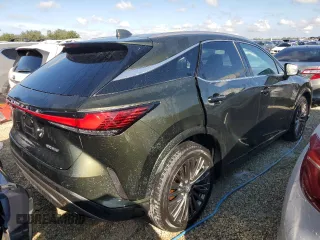 2023 Lexus RX with VIN 2T2BAMBA3PC001898, listed as a Copart auction lot 74104154 with 6,702 mi miles and Salvage Title. Bid and sale history available at carsss.com. Image 3.