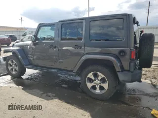 2017 Jeep Wrangler Unlimited Sahara with VIN 1C4HJWEG4HL615069, listed as a Copart auction lot 46480225 with 104,723 mi miles and Salvage title. Bid and sale history available at DreamBid. Image 2.
