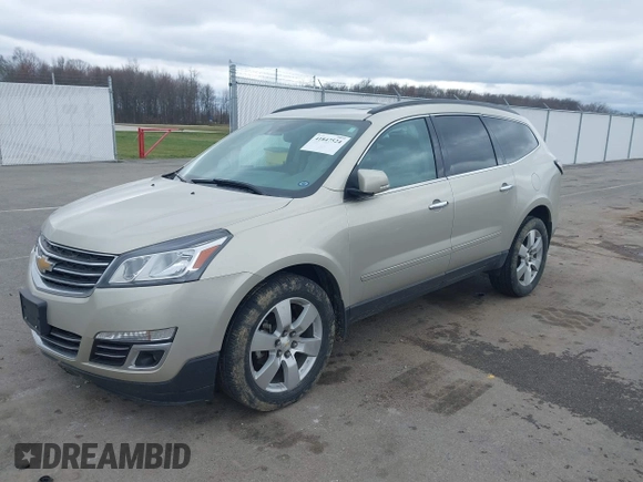 2015 Chevrolet Traverse LTZ z VIN 1GNKRJKD6FJ237851, wystawiony jako IAAI lot #41847524 z przebiegiem 84 809 mil mil oraz . Historia ofert i sprzedaży dostępna na DreamBid. Obrazek 2.