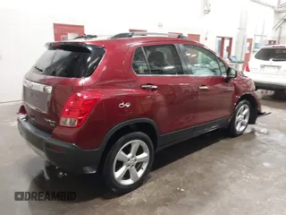 2016 Chevrolet Trax LTZ with VIN 3GNCJRSB9GL166289, listed as a IAAI auction lot 41674434 with 157,109 mi miles. Bid and sale history available at carsss.com. Image 4.