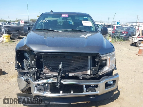 2020 Ford F-150 XL with VIN 1FTEW1E54LFB68322, listed as a IAAI auction lot 42127259 with 85,085 mi miles. Bid and sale history available at carsss.com. Image 12.