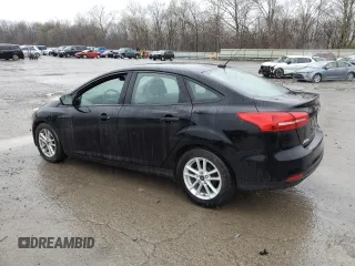 2017 Ford Focus SE with VIN 1FADP3F2XHL316724, listed as a Copart auction lot 52321155 with 137,005 mi miles and Salvage Title. Bid and sale history available at DreamBid. Image 2.