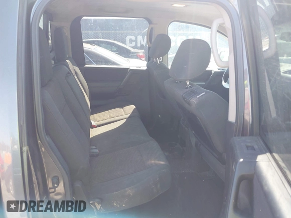 2012 Nissan Titan SV with VIN 1N6AA0EDXCN325756, listed as a IAAI auction lot 42025837 with 218,658 mi miles and . Bid and sale history available at DreamBid. Image 8.