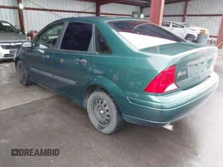 2001 Ford Focus LX with VIN 1FAFP33P51W205396, listed as a IAAI auction lot 41563111 with 95,882 mi miles and . Bid and sale history available at carsss.com. Image 3.