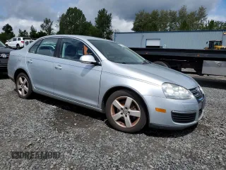 2009 Volkswagen Jetta SE with VIN 3VWRM71K99M156016, listed as a Copart auction lot 57711095 with 206,869 mi miles and Clean title. Bid and sale history available at DreamBid. Image 4.