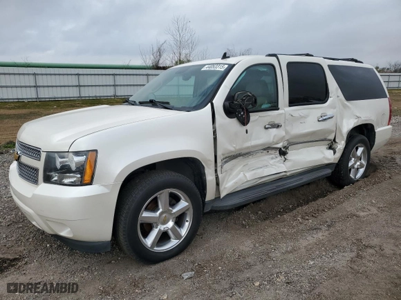 2012 Chevrolet Suburban LTZ with VIN 1GNSCKE02CR199645, listed as a Copart auction lot 47209145 with 128,454 mi miles and Salvage Title. Bid and sale history available at carsss.com. Image 1.