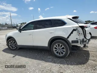 2019 Mazda CX-9 Touring with VIN JM3TCACY7K0327632, listed as a Copart auction lot 60798635 with 63,087 mi miles and Salvage title. Bid and sale history available at DreamBid. Image 2.