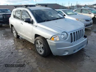 2010 Jeep Compass Sport with VIN 1J4NF4FB3AD589361, listed as a IAAI auction lot 41449412 with 127,807 mi miles. Bid and sale history available at carsss.com. Image 1.