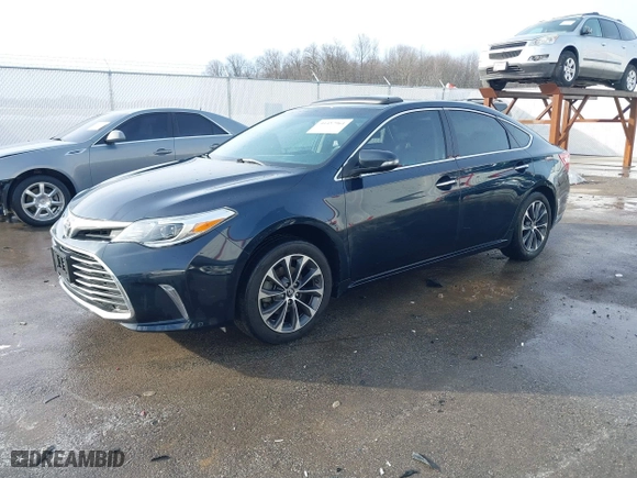 2016 Toyota Avalon Limited with VIN 4T1BK1EB2GU237722, listed as a IAAI auction lot 41457961 with 107,139 mi miles. Bid and sale history available at carsss.com. Image 17.