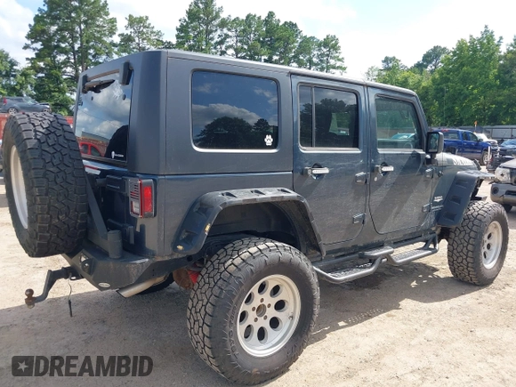 2008 Jeep Wrangler Unlimited Sahara with VIN 1J4GA591X8L520621, listed as a IAAI auction lot 42525613 with 184,239 mi miles and . Bid and sale history available at DreamBid. Image 4.
