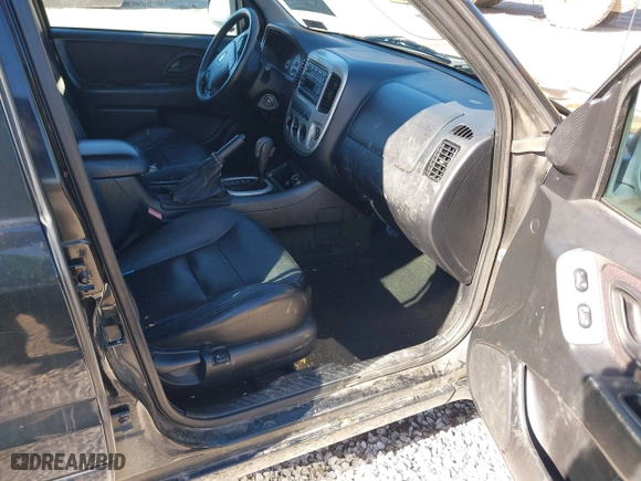 2005 Ford Escape Limited with VIN 1FMCU04155KE23314, listed as a IAAI auction lot 41685671 with 265,731 mi miles. Bid and sale history available at carsss.com. Image 5.