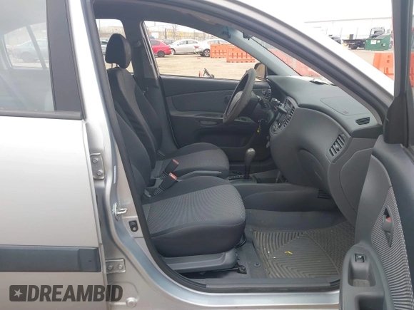 2009 Kia Rio LX with VIN KNADE243596544181, listed as a IAAI auction lot 41876733 with 200,216 mi miles. Bid and sale history available at carsss.com. Image 5.