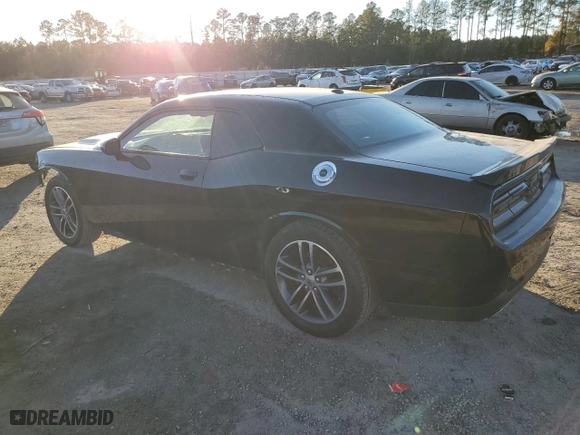 2019 Dodge Challenger SXT with VIN 2C3CDZGG5KH583807, listed as a Copart auction lot 85196374 with 77,953 mi miles and Salvage Title. Bid and sale history available at carsss.com. Image 2.
