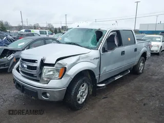2014 Ford F-150 XL with VIN 1FTFW1EFXEKF79876, listed as a IAAI auction lot 42011856 with 161,366 mi miles and . Bid and sale history available at carsss.com. Image 2.