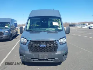2021 Ford Transit Cargo with VIN 1FTBR3X84MKA54150, listed as a IAAI auction lot 41671756 with 96,556 mi miles and . Bid and sale history available at DreamBid. Image 12.
