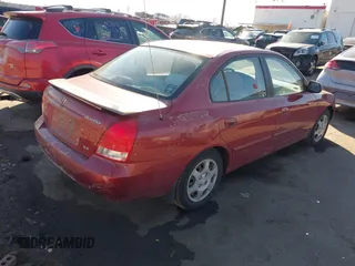 2003 Hyundai Elantra GLS z VIN KMHDN45D93U469313, wystawiony jako IAAI lot #41697422 z przebiegiem 178 571 mil mil oraz . Historia ofert i sprzedaży dostępna na DreamBid. Obrazek 4.