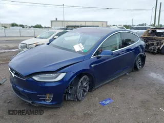 2018 Tesla Model X 75D with VIN 5YJXCAE2XJF111180, listed as a IAAI auction lot 41988079 with 114,593 mi miles and . Bid and sale history available at DreamBid. Image 17.