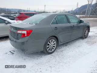 2014 Toyota Camry L with VIN 4T1BF1FK5EU774116, listed as a IAAI auction lot 41286569 with 184,797 mi miles. Bid and sale history available at carsss.com. Image 4.