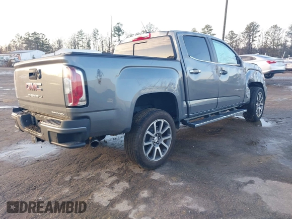 2021 GMC Canyon 4WD Denali with VIN 1GTG6EEN2M1123409, listed as a IAAI auction lot 41486932 with 1 mi miles. Bid and sale history available at carsss.com. Image 4.