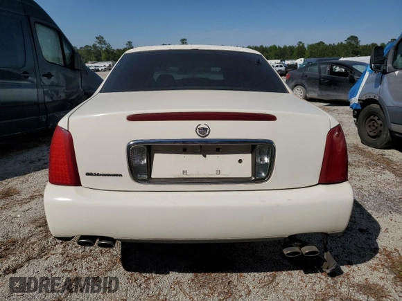 2002 Cadillac DeVille Limousine z VIN 1GEEH90Y72U550842, wystawiony jako Copart lot #52629735 z przebiegiem Nie podano mil oraz Szkoda całkowita • Salvage title. Historia ofert i sprzedaży dostępna na DreamBid. Obrazek 6.