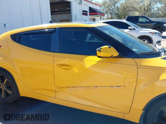 2013 Hyundai Veloster w/Gray Int with VIN KMHTC6AD8DU093272, listed as a IAAI auction lot 40407768 with 91,038 mi miles and . Bid and sale history available at DreamBid. Image 17.