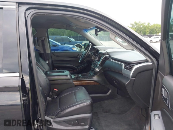 2015 Chevrolet Tahoe LT with VIN 1GNSCBKC4FR145119, listed as a IAAI auction lot 42309931 with 99,408 mi miles and . Bid and sale history available at DreamBid. Image 5.