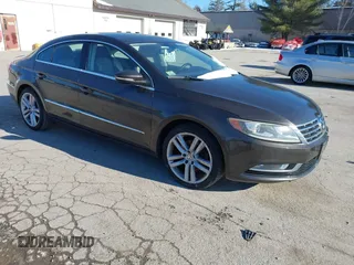2013 Volkswagen CC Lux with VIN WVWRP7ANXDE522469, listed as a IAAI auction lot 41413025 with 115,117 mi miles. Bid and sale history available at carsss.com. Image 1.