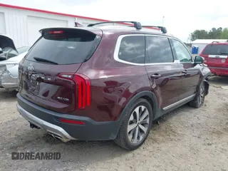 2020 Kia Telluride EX with VIN 5XYP3DHC1LG056748, listed as a IAAI auction lot 41926108 with 91,751 mi miles and . Bid and sale history available at DreamBid. Image 4.
