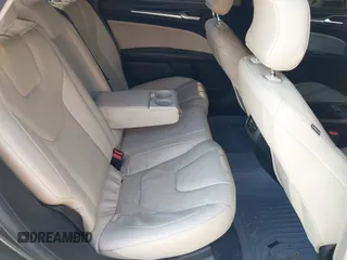 2017 Ford Fusion Titanium with VIN 3FA6P0K98HR124035, listed as a IAAI auction lot 42307936 with Not provided miles and . Bid and sale history available at DreamBid. Image 8.