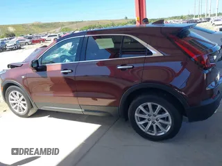 2022 Cadillac XT4 FWD Luxury with VIN 1GYAZAR42NF162880, listed as a IAAI auction lot 41850951 with 47,344 mi miles and . Bid and sale history available at carsss.com. Image 14.