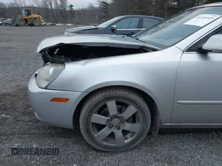 2007 Kia Optima EX with VIN KNAGE124375162317, listed as a IAAI auction lot 41246445 with 174,128 mi miles. Bid and sale history available at carsss.com. Image 12.