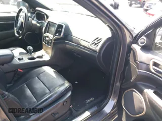 2014 Jeep Grand Cherokee Summit with VIN 1C4RJFJG8EC434899, listed as a IAAI auction lot 42399912 with 186,840 mi miles and . Bid and sale history available at DreamBid. Image 5.