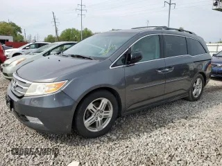 2012 Honda Odyssey Touring with VIN 5FNRL5H91CB120314, listed as a Copart auction lot 53877435 with 222,935 mi miles and Salvage Title. Bid and sale history available at DreamBid. Image 1.